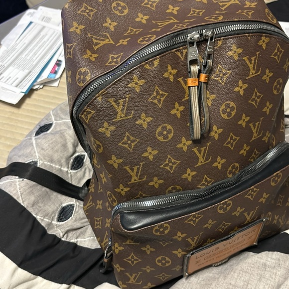 Louis Vuitton Monogram Discovery Backpack - Picture 14 of 17